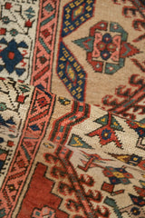 Hand-knotted texture of the antique Serab runner, displaying pawn border and floral motifs.