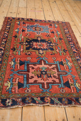 Vintage Karaja rug, angled view showcasing geometric medallions and varied pile texture.