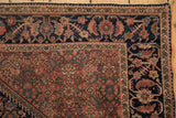 Antique Farahan Sarouk corner: Herati border's pomegranate, henna field. Navy, cochineal red tones.