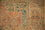 Evenly worn, hand-knotted pile of a vintage Malayer carpet in terracotta and dusty sky blue.