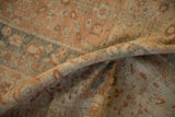 Detail of a vintage Malayer carpet's flexible weave and low, time-softened pile.