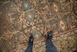 Distressed, time-softened pile of a vintage Mahal carpet with oversized palmettes in teal, blue, and sand.