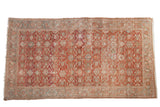 Vintage distressed Mahal rug with an allover palmette pattern in pale raspberry red and dusty blue.