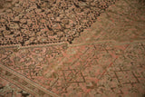Heavy abrash and even wear across the knot heads of a vintage distressed Malayer carpet.