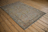Vintage distressed Sarouk rug with Gol Ferang floral design in soft blue, terracotta, rose, 4'3