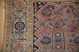 Antique Distressed Malayer rug border with worn selvage, coral, navy floral and geometric vinery.