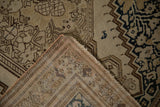 Distressed pile and hand-knotted back of an antique Persian Malayer rug corner.