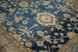 Heavy abrash creates dynamic color variation on the worn pile of this distressed Hamadan rug.
