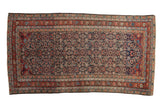 Antique Malayer carpet with an allover Herati design in navy blue, brick red, and sand.