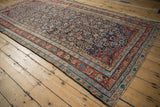 Intact side cord selvage and detailed borders of an antique Malayer carpet.