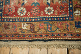 Intact macrame fringe, cotton selvage, and visible knot heads on an antique Persian runner.