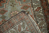 Vintage Malayer rug back, showing hand-knotted construction and original side selvage.