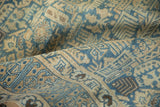 Soft, even pile of a vintage Tabriz rug, showing the geometric pattern in a gentle fold.