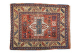 Antique hand-knotted Kazak square rug with brick red medallion, geometric motifs, and sand border.