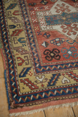 Antique Kazak rug, main border with serrated leaf motif on unusual yellow ground.