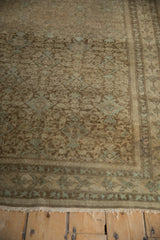 Distressed antique Malayer rug with aged Herati pattern, pale coffee brown, dusty blue, tattered fringe.