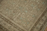 Worn texture on antique Malayer rug corner, subtle Herati design in coffee and blue.