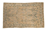 Antique distressed Persian Yezd rug, ivory field, expressive floral vines, dusty blue-green accents, 4'4