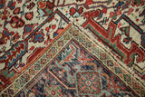 Heriz carpet close-up: plush pile, detailed back foundation, and partly restored side selvage.