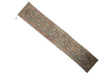 Distressed vintage Malayer runner with finned palmettes on an abrashed, dusty blue field with rust and beige details.