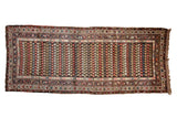 Vintage Kurdish Hamadan runner with rainbow botehs in staggered rows on a chocolate brown field.