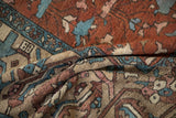 Textured fold of antique Karaja carpet, revealing worn copper, dusty teal, and beige patterns.