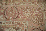 Vintage Distressed Yezd carpet with pale raspberry field, soft palmettes, and fine worn texture.