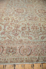 Dusty blush Herati main border and powder blue field of a Distressed Yezd rug.