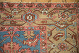 Blush, sky blue, and sand serrated guls and floral patterns on an antique Bakshaish carpet.