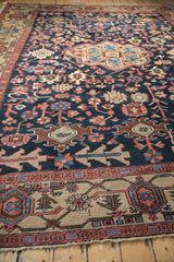 Detailed Turtle Samovar border of a vintage Gorevan carpet with madder red and blue hues.