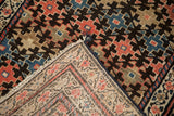 Hand-knotted foundation, woven selvage, and geometric pattern on reverse of antique Malayer runner.