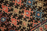 Lattice pattern with charcoal, ruby red, and sky blue abrash on antique Malayer rug.