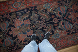 Antique Malayer rug field: dragon stylized leaves, ruby red palmettes, navy blue, even wear.