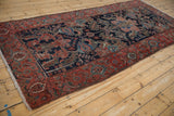 Antique Persian Malayer detail: ruby red turtle samovar border, navy field with palmettes.