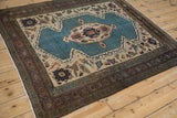 Angled view of a collector's Persian Bakshaish rug, showcasing its complete geometric design and composition.