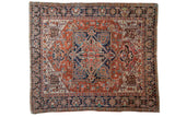 Vintage Gorevan carpet with quatrefoil medallion, geometric blossoms, brick red and sapphire blue.