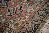 Detail of a vintage Gorevan rug border, showcasing its rare checkered floral and serrated leaf elements.