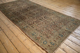 Full perspective of an antique Persian Malayer runner with a time-softened Herati design.