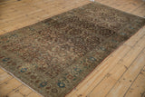 Angled perspective of an antique Malayer rug runner showing its Herati field pattern.