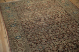 Side perspective of the antique Malayer runner, detailing the boteh border and dense Herati field.