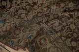 Hand-knotted texture of the antique Malayer rug showing even wear across the low wool pile.