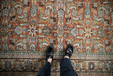 Vintage Mahal rug: Herati palmettes, scrolled leaves, and vining border in rust, ivory tones.
