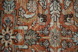 Close-up of Mahal carpet pile, featuring rust, ivory, and denim blue Herati and pawn motifs.