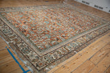 Vintage Mahal carpet corner, showcasing reciprocating pawn border, floral vinery, and intact selvage.