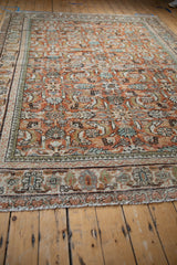 Vintage Mahal carpet: secured fringe, lower border with floral vinery, Herati design.