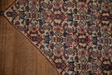 Camel brown field with abrashes alongside the fine Herati design within the corner spandrel.