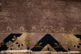 Tattered ivory fringe and worn pile revealing the knot heads of an antique Peking rug.