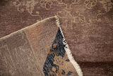 Reverse view of an antique Peking rug showing the hand-knotted foundation and original side cord.
