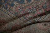 Distressed vintage Farahan Sarouk carpet texture in muted rose, dusty blue, and beige.