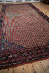 Madder root red and ivory vinery columns with sapphire blue lattice corner on antique Qashqai rug.